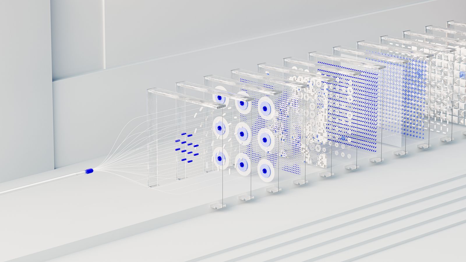 Investigador frente a pantallas con visualizaciones de redes neuronales en un laboratorio tecnológico.